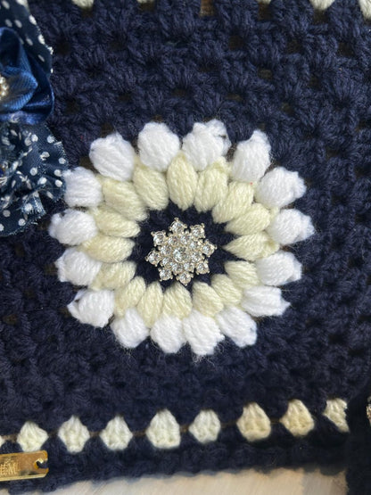 Vintage crochet tote handle and brooch detail
