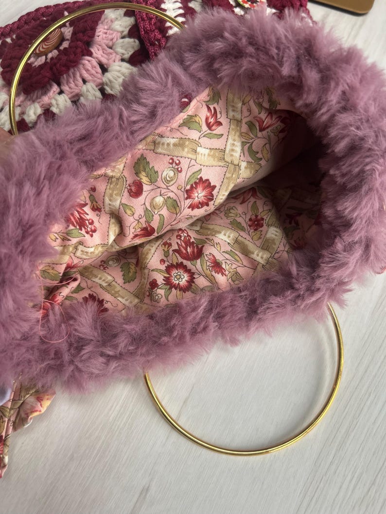 Detail of the floral granny-square crochet motifs