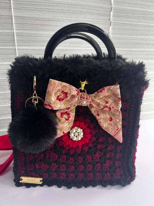 Burgundy and black crochet granny-square tote with faux fur trim
