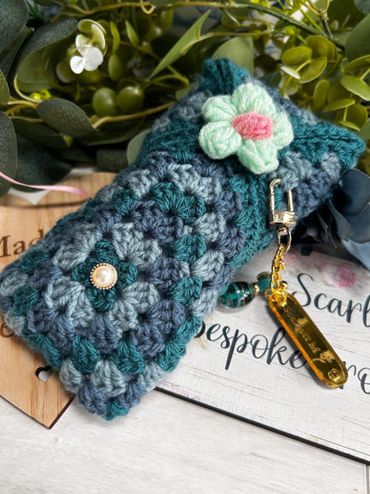 Teal crochet case with mint and pink flower