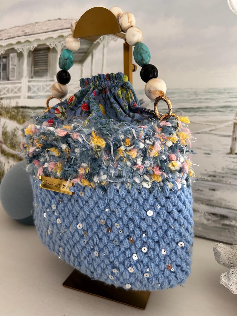 Seabloom blue crochet handbag with beaded handle