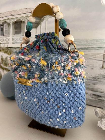 Seabloom blue crochet handbag with beaded handle