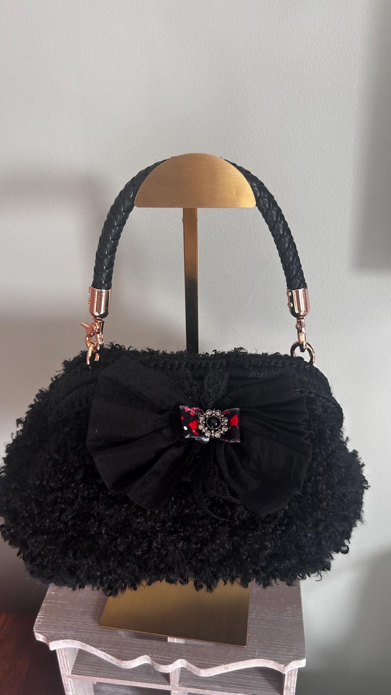 Black bow bag with rose gold hardware