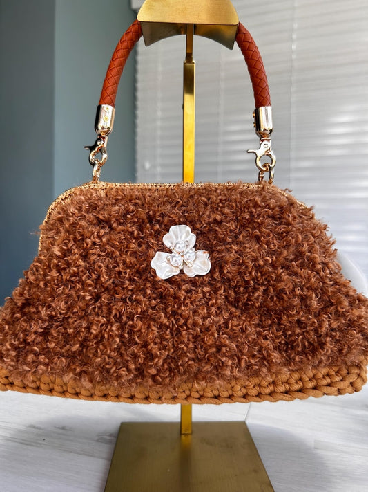 Cinnamon brown plush handbag with white flower