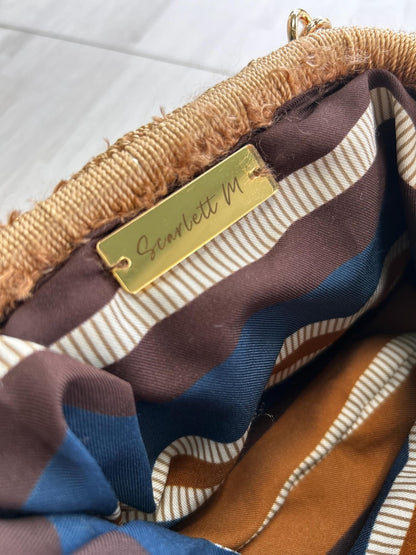 Striped interior lining with Scarlett M tag
