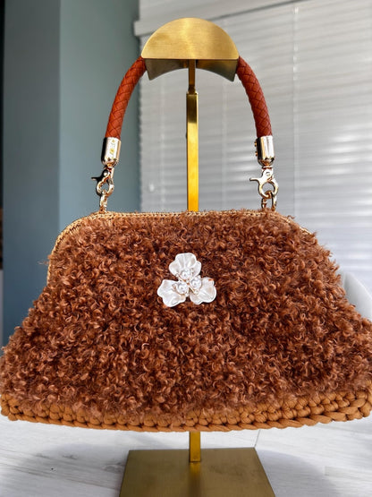 Brown curly faux fur handbag with pearl flower