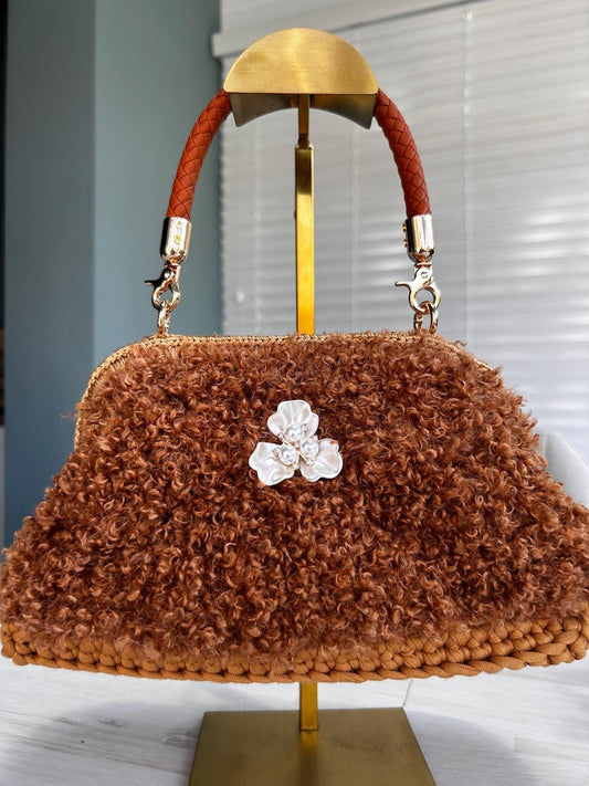 Brown curly faux fur handbag with pearl flower