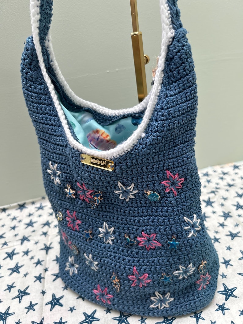 Coastal blue floral crochet shoulder bag by Scarlett M
