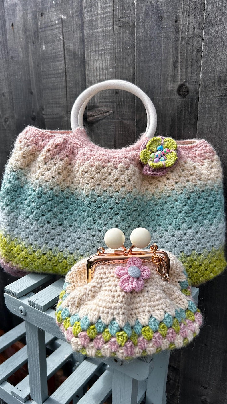 Pastel crochet handbag beside matching coin purse