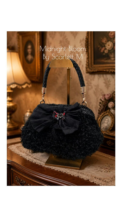 Black Midnight Bloom bow purse with floral accent
