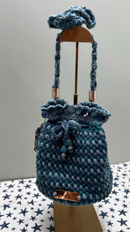 Blue crochet drawstring bag with sequin trim and Scarlett M tag